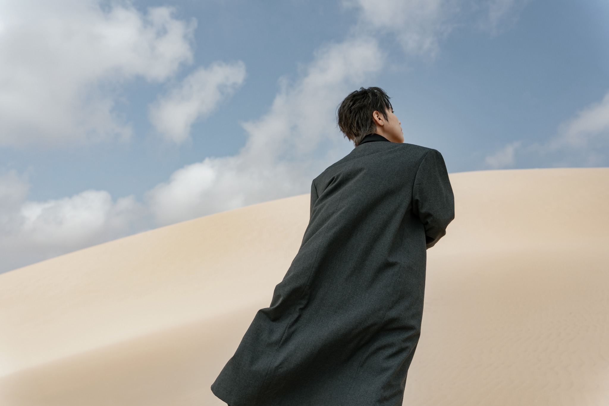 VUCATTUONG looking ahead across the sand